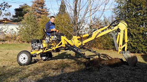 how to tow a mini excavator|towable backhoe with hydraulic outriggers.